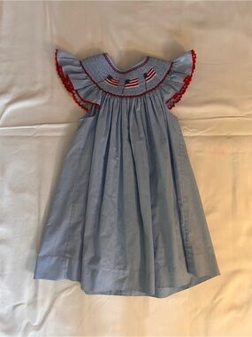 Girls' Light Blue Smocked Dress with Red Trim and Flag Embroidery